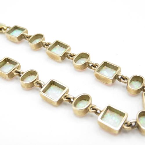 239 - 9ct gold opal triplet bracelet 11.7g - 19cm