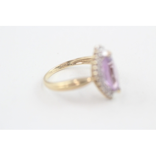 103 - 9ct gold marquise cut amethyst & diamond dress ring, claw set (3g) Size  O