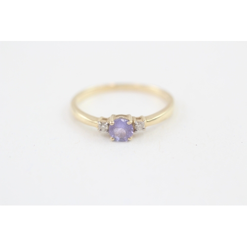 106 - 14ct gold tanzanite & diamond three stone ring (1.9g) Size  P