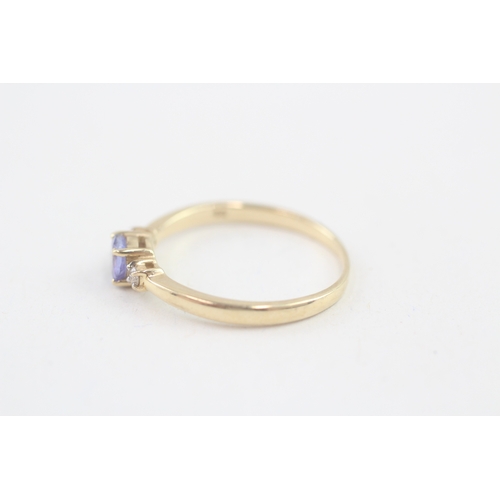 106 - 14ct gold tanzanite & diamond three stone ring (1.9g) Size  P