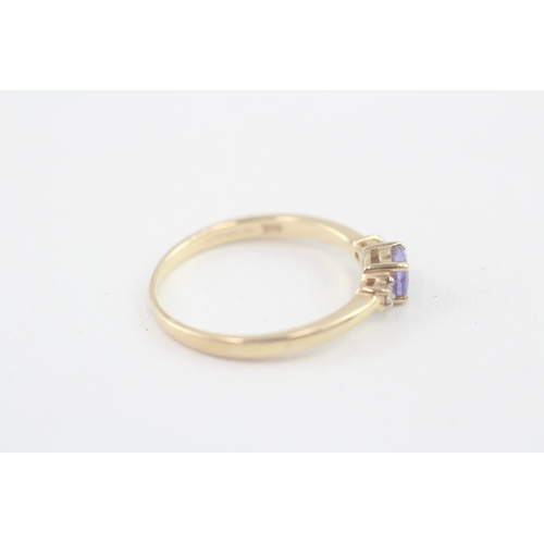 106 - 14ct gold tanzanite & diamond three stone ring (1.9g) Size  P