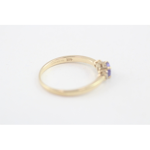 106 - 14ct gold tanzanite & diamond three stone ring (1.9g) Size  P