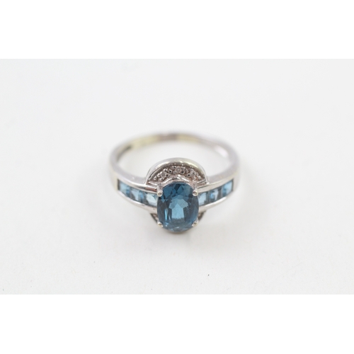 16 - 9ct gold blue topaz & diamond dress ring (3.4g) Size  P