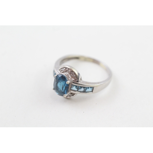 16 - 9ct gold blue topaz & diamond dress ring (3.4g) Size  P