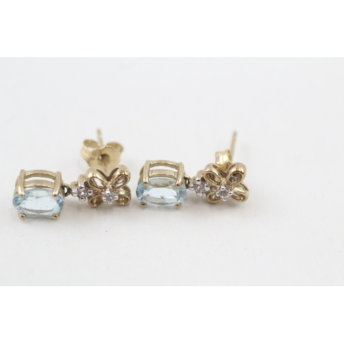 17 - 9ct gold blue topaz & diamond floral drop earrings with scroll backs (2.4g)