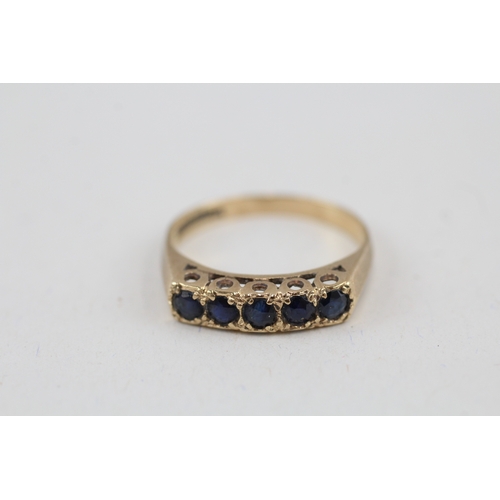 34 - 9ct gold sapphire half eternity ring (2.3g) Size  Q