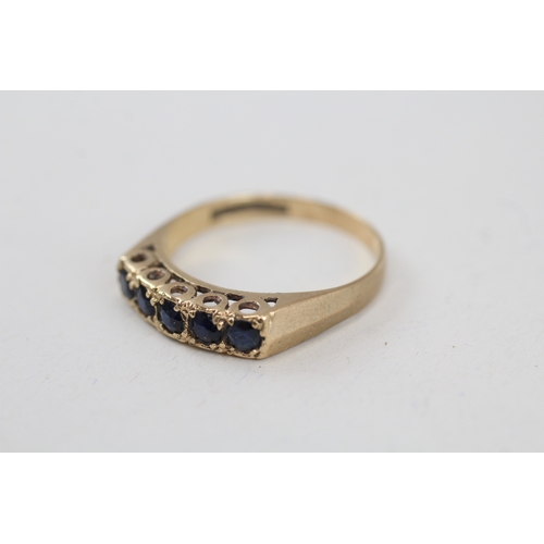 34 - 9ct gold sapphire half eternity ring (2.3g) Size  Q