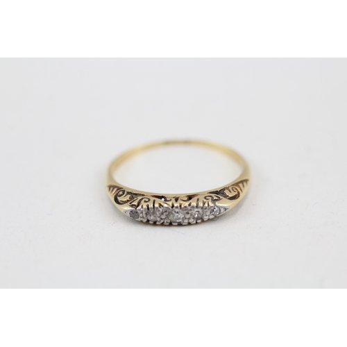 43 - 18ct gold vintage diamond ring with a patterned gallery (2.2g) Size  O