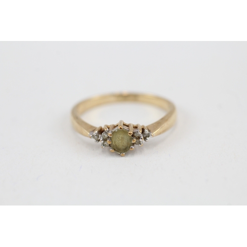 46 - 9ct gold green gemstone & diamond ring (2.2g) Size  P