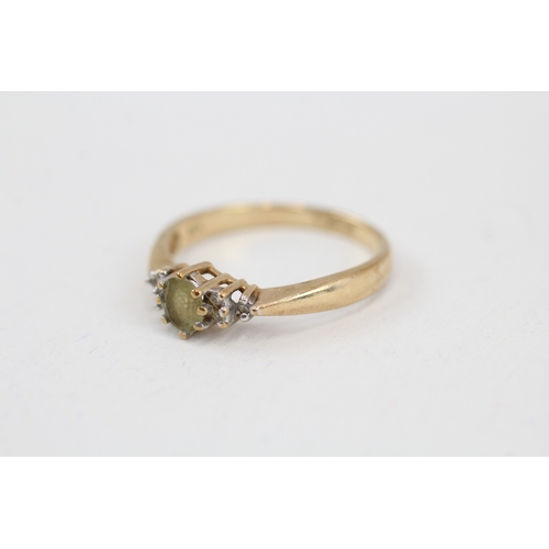 46 - 9ct gold green gemstone & diamond ring (2.2g) Size  P