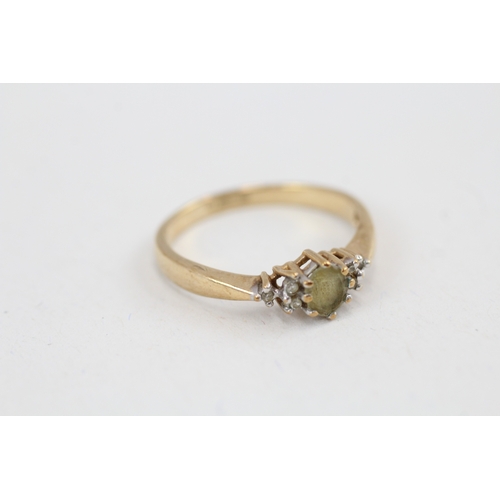 46 - 9ct gold green gemstone & diamond ring (2.2g) Size  P