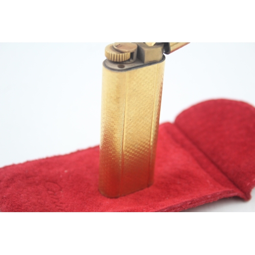 460 - A Cartier Paris Gold Plated Pocket Lighter In Suede Pouch w/ Guilloche Finish