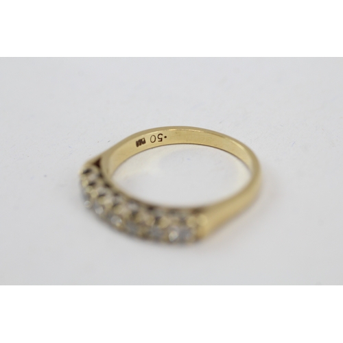 49 - 18ct gold diamond half eternity ring (3.2g) Size  N