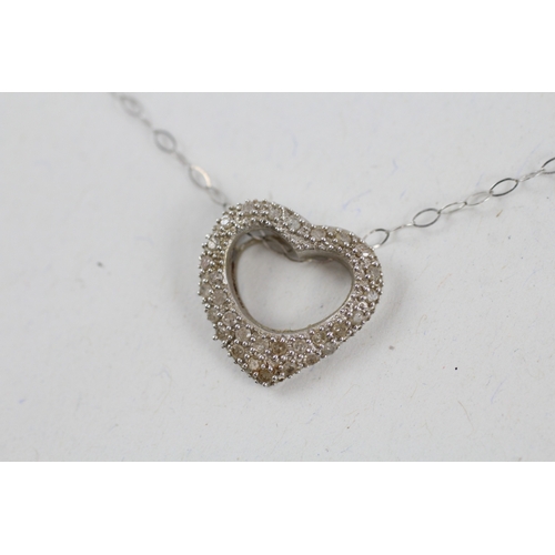 53 - 9ct gold diamond heart shape pendant necklace (1.9g)