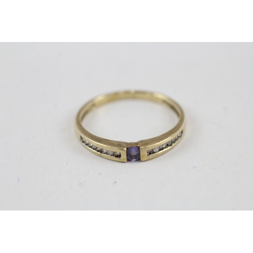 54 - 9ct gold tanzanite & diamond ring (1.7g) Size  P