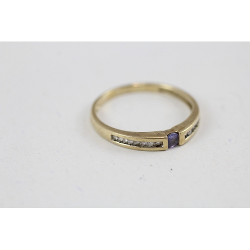 54 - 9ct gold tanzanite & diamond ring (1.7g) Size  P