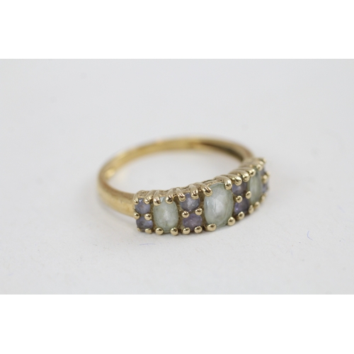 58 - 9ct gold blue topaz & tanzanite ring, claw set (2.5g) Size  R