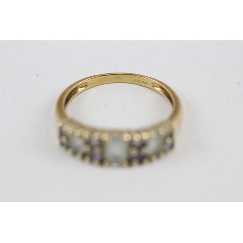 58 - 9ct gold blue topaz & tanzanite ring, claw set (2.5g) Size  R