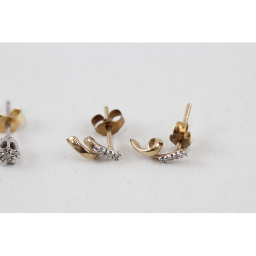 60 - 2x 9ct gold diamond earrings with scroll backs (1.7g)