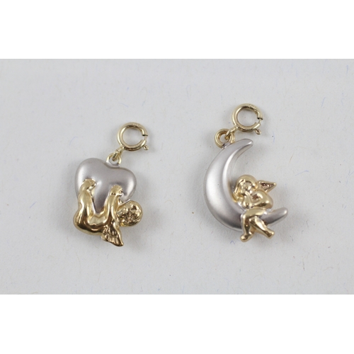 65 - 2x 9ct gold cherub with crescent & heart charms (1.2g)