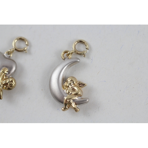 65 - 2x 9ct gold cherub with crescent & heart charms (1.2g)