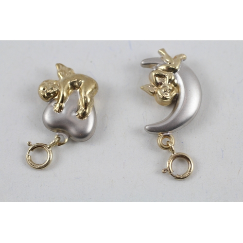 65 - 2x 9ct gold cherub with crescent & heart charms (1.2g)