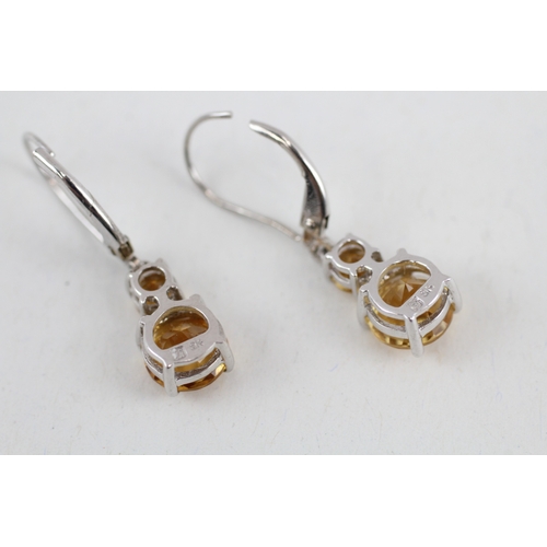 73 - 9ct gold graduated citrine drop earring (2.3g)