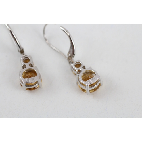 73 - 9ct gold graduated citrine drop earring (2.3g)