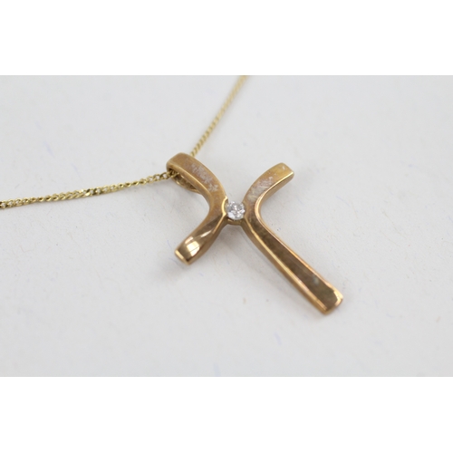 76 - 9ct gold diamond cross pendant necklace (1.8g)