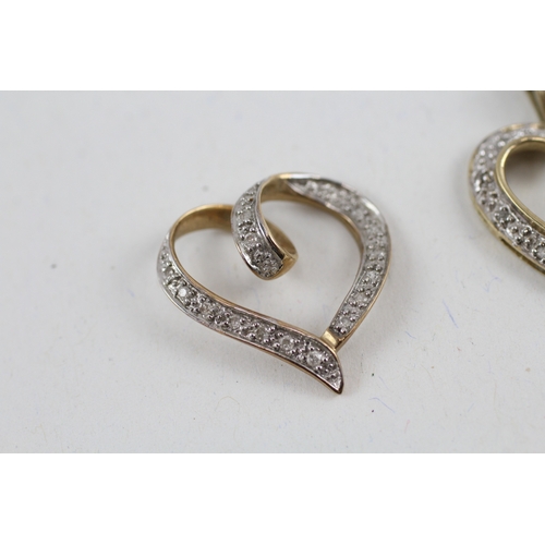 78 - 2x 9ct gold diamond heart shape pendants (3g)