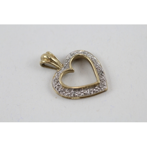 78 - 2x 9ct gold diamond heart shape pendants (3g)