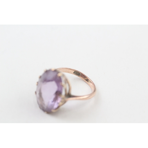 96 - 9ct gold oval cut amethyst dress ring (5.4g) Size  L