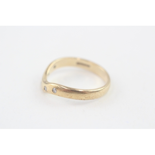 99 - 9ct gold diamond wishbone ring (2.7g) Size  P