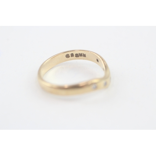 99 - 9ct gold diamond wishbone ring (2.7g) Size  P