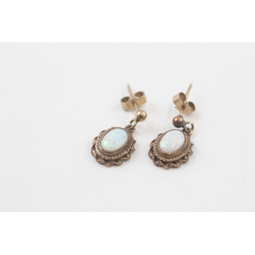 27 - 9ct gold opal drop earrings with scroll backs (2g)