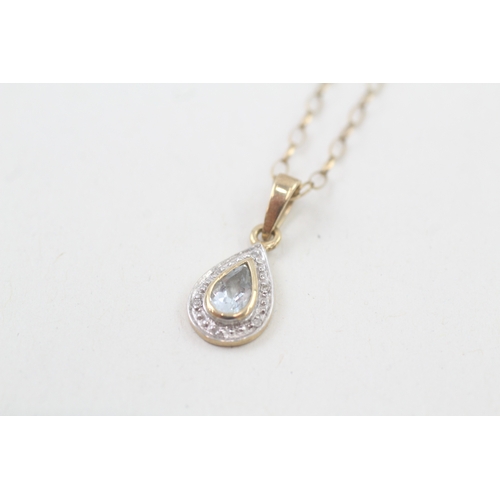 35 - 9ct gold pear cut blue topaz & diamond pendant necklace (1.6g)