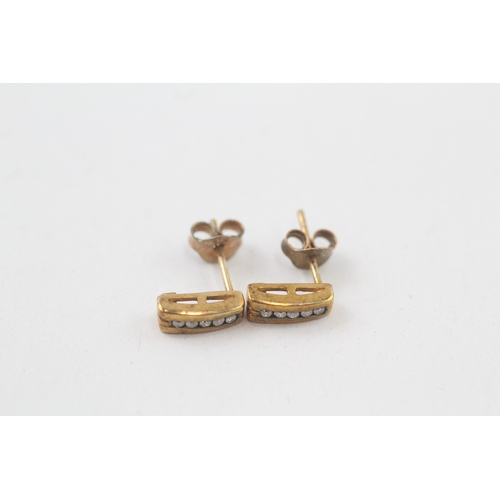 36 - 9ct gold diamond stud earrings with scroll backs (1.1g)