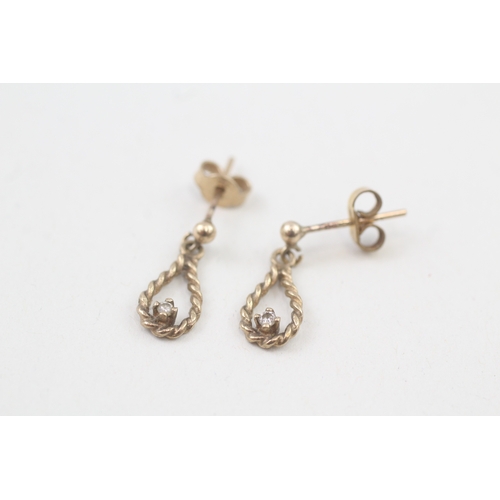 37 - 9ct gold diamond drop earrings with scroll backs (1.4g)