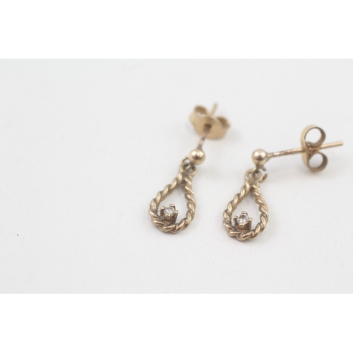 37 - 9ct gold diamond drop earrings with scroll backs (1.4g)