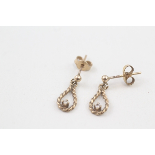 37 - 9ct gold diamond drop earrings with scroll backs (1.4g)