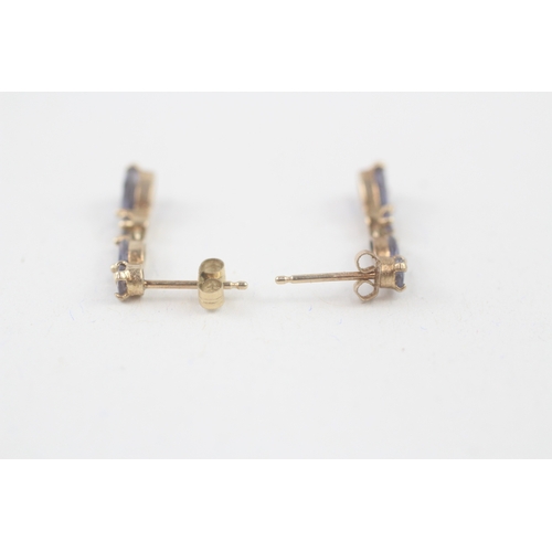 56 - 9ct gold iolite & tanzanite drop earrings with scroll backs (1.1g)