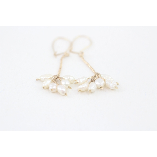 58 - 9ct gold rice pearl drop earrings (1.3g)