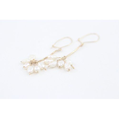 58 - 9ct gold rice pearl drop earrings (1.3g)