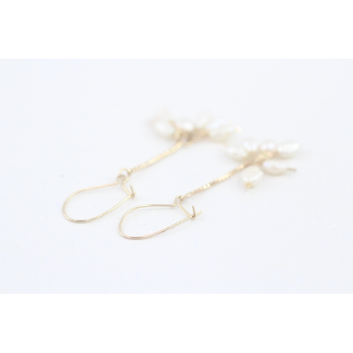 58 - 9ct gold rice pearl drop earrings (1.3g)