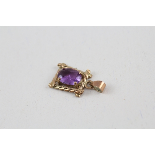 74 - 2x 9ct gold amethyst pendant & stud earrings set (1.7g)