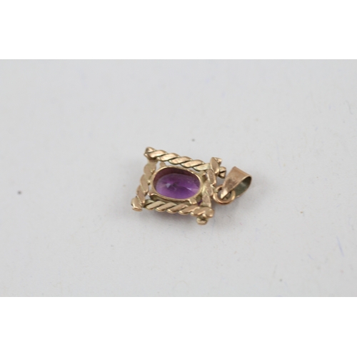 74 - 2x 9ct gold amethyst pendant & stud earrings set (1.7g)