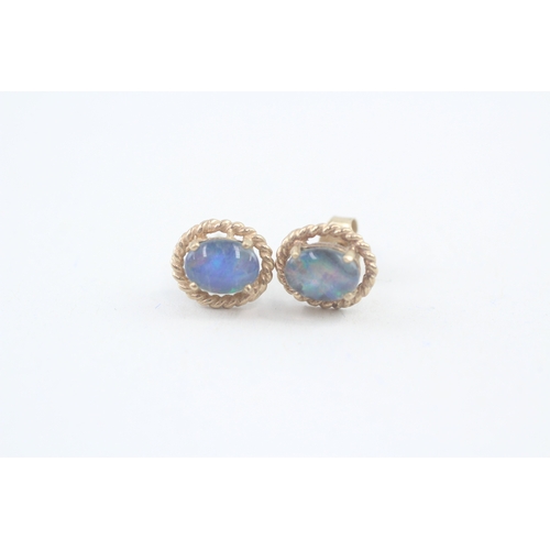 8 - 2x 9ct gold white opal & opal triplet stud earrings with scroll backs (2.5g)