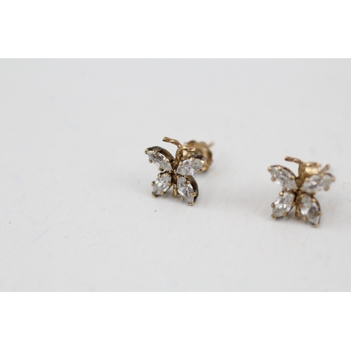 86 - 9ct gold cubic zirconia set butterfly stud earrings (0.7g)