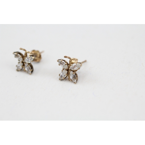 86 - 9ct gold cubic zirconia set butterfly stud earrings (0.7g)