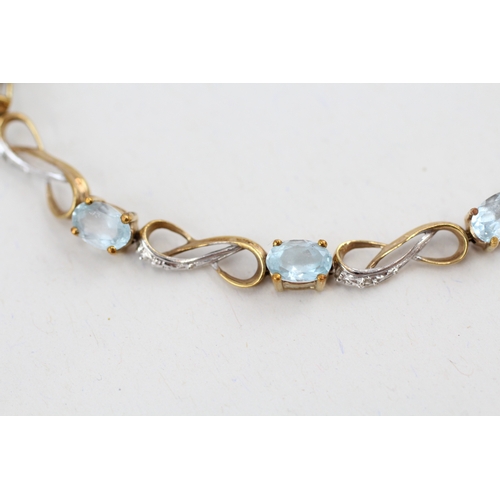 89 - 9ct gold topaz and diamond set line bracelet (5.8g)